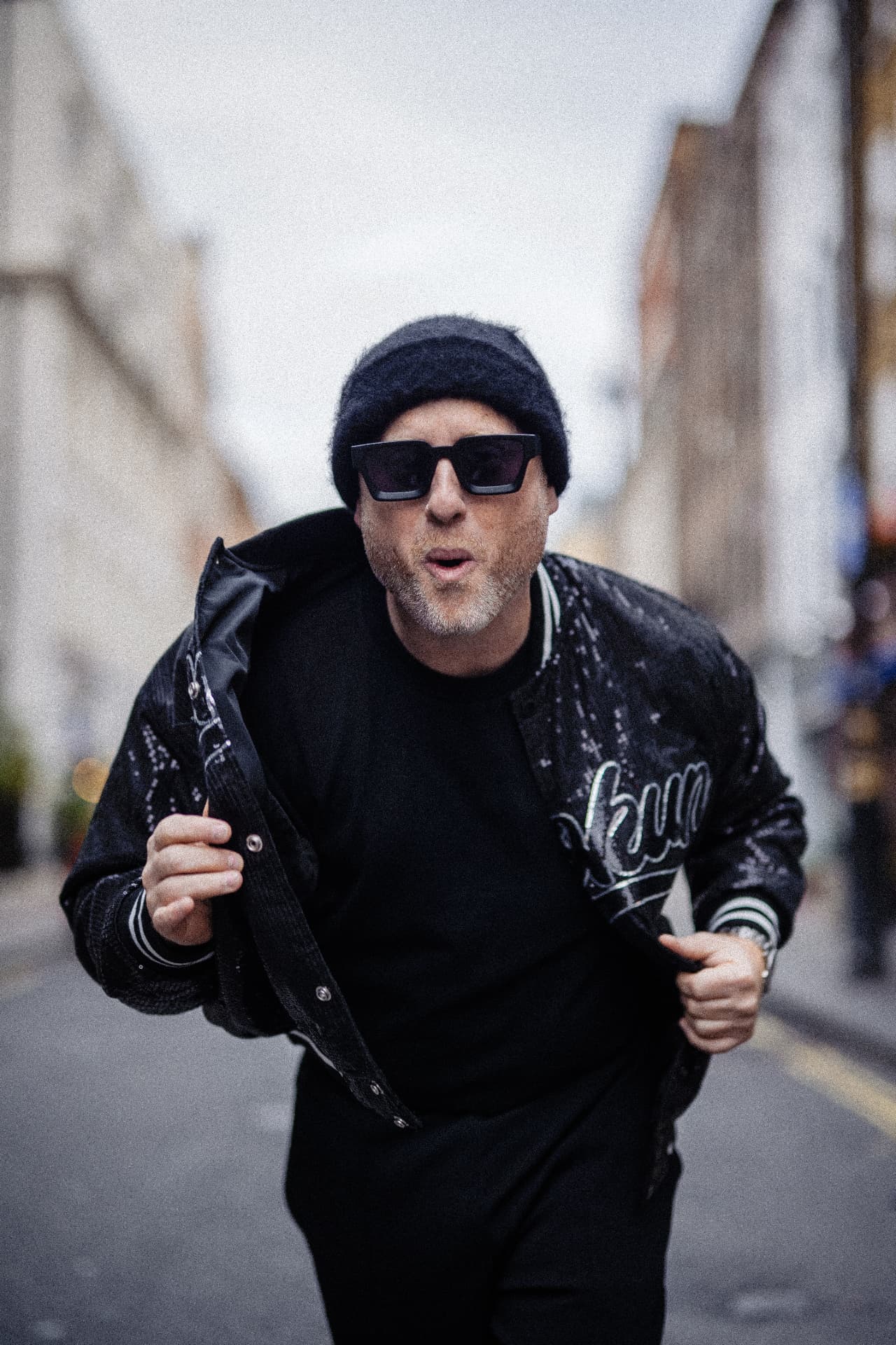 Biblical Beats in a sequin bomber on a London street